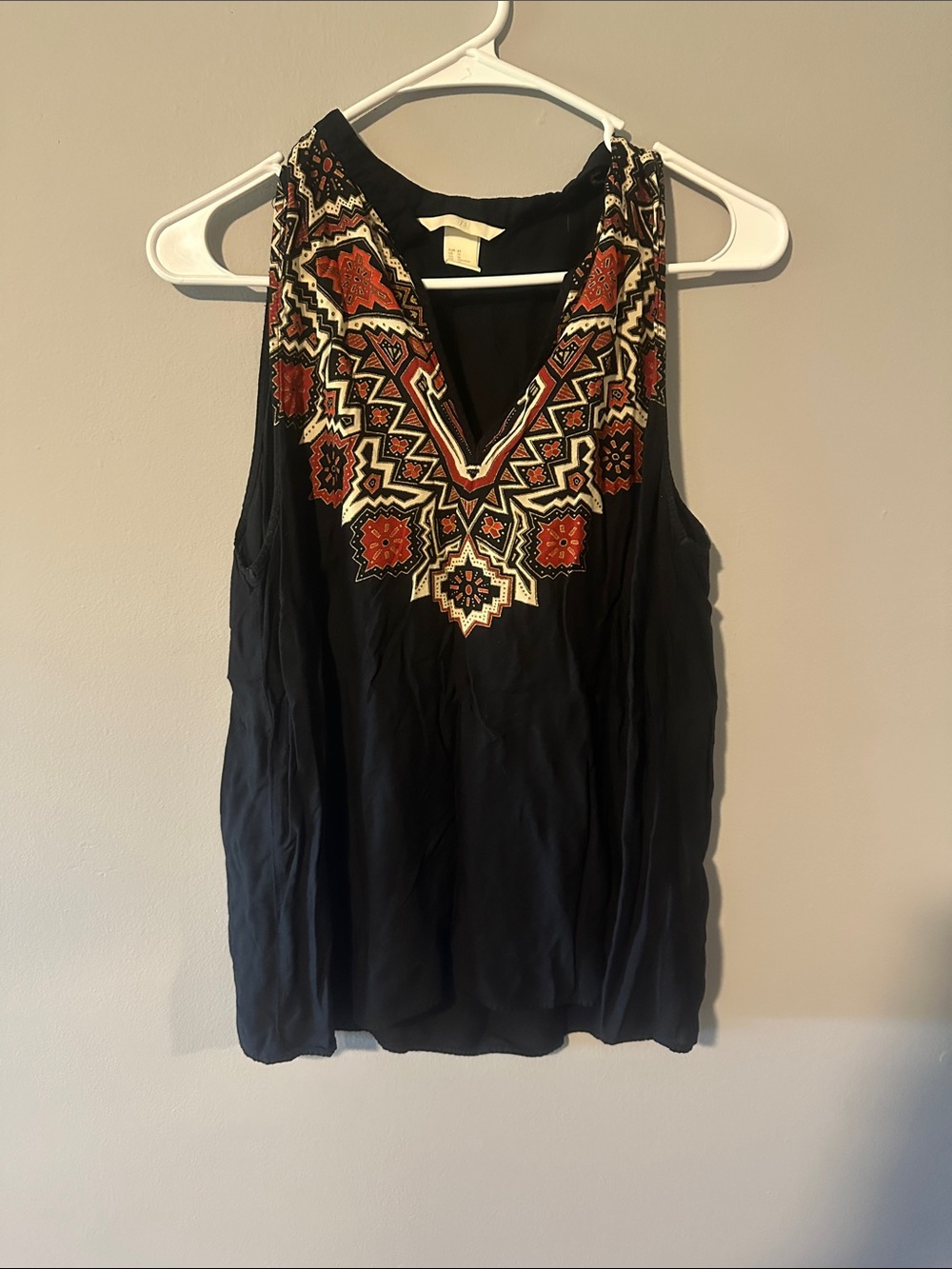 H&M Black Sleeveless Blouse with Rust and Cream Embroidery